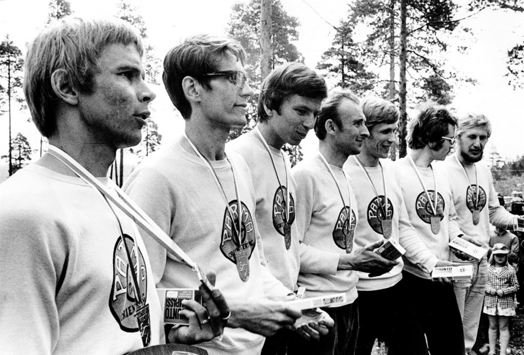 Paimion Jukolan 1972 voittajajoukkue Tuomo Peltola (vas.), Veikko Kiili, Timo Peltola, Tapio Torpo, Timo Grönroos, Raimo Jalonen ja Reijo Lehkonen. Kuva TS/arkisto lehdestä TS, Jukolan viehätys vain voimistuu, 25.4.2015.